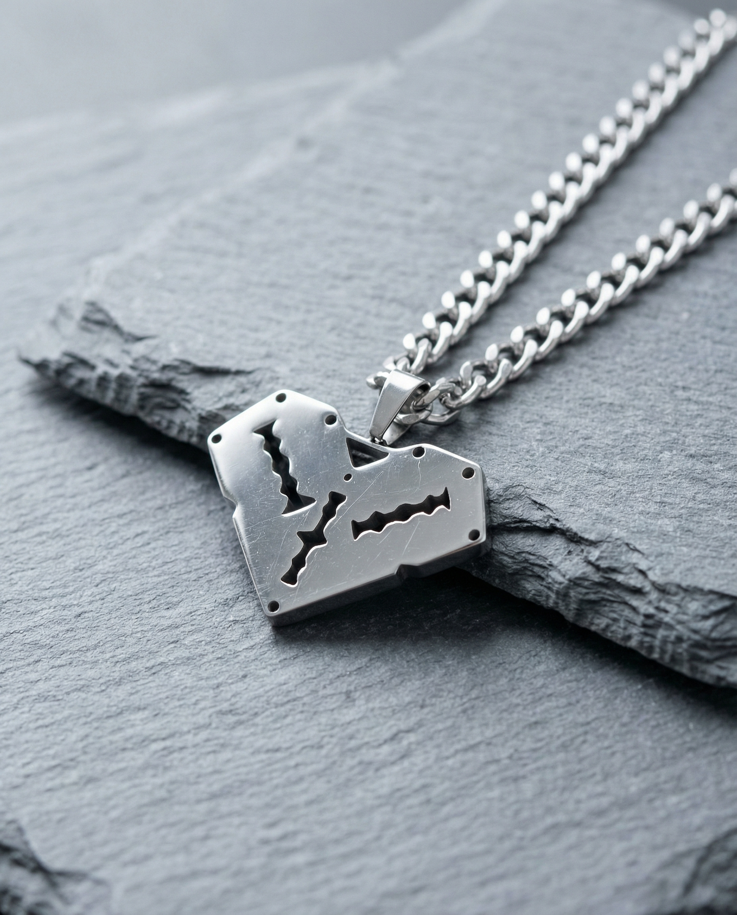 Razor heart necklace