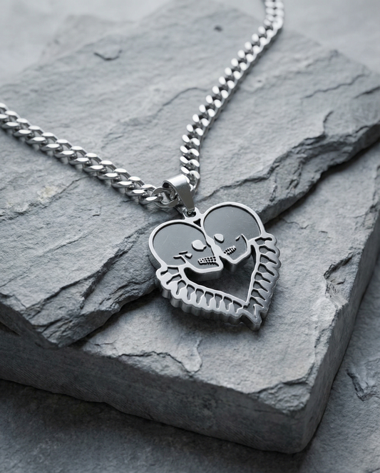 Skull face heart necklace